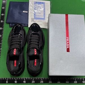 Prada Black Sneakers with Red Accents